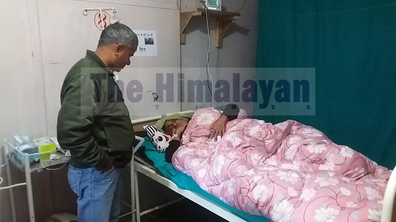 Dr Govinda KC lies on a hospital bed in Dadeldhura Hopital, on Saturday, November 9, 2019. The senior doctor was taken to the hospital for treatment after his health started weakening during the course of hunger strike. Photo: Baburam Shrestha/THT