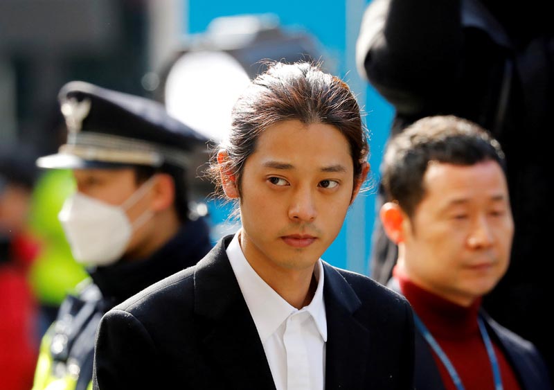 South Korean singer Jung Joon-young arrives for questioning on accusations of illicitly taping and sharing sex videos on social media, at the Seoul Metropolitan Police Agency in Seoul, South Korea, March 14, 2019. Photo: Reuters
