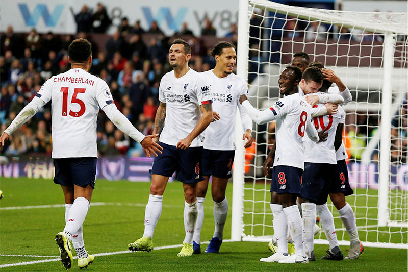 Liverpool's Sadio Mane celebrates scoring their second goal with teammates. Photo: Reuters