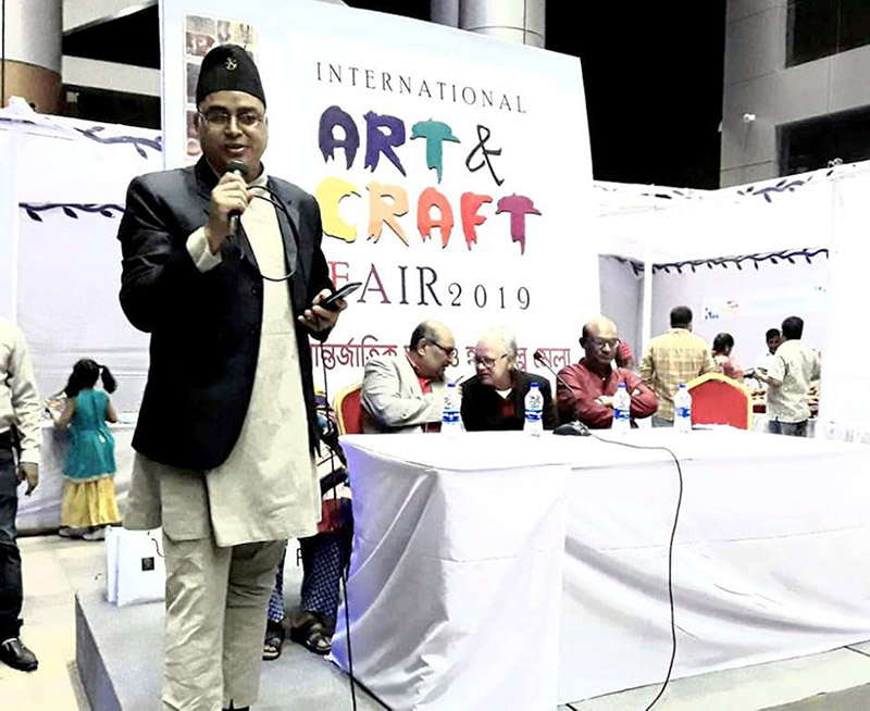 Nepali artist Dipendra Man Banepali addressing the participants and guests at the International Art and Craft Fair, taking place in Dhaka, capital of Bangladesh, on Tuesday, November 26, 2019. Photo: RSS
