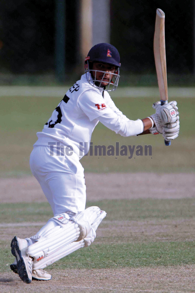 Sandeep Lamichhane bats against Marylebone Cricket Club on the second day of a three day cricket match at TU Stadium, Kirtipur in Kathmandu on Thursday. Photo: THT