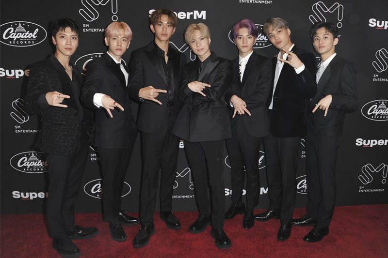 FILE - This Oct. 3, 2019 file photo shows, from left, Ten, Baekhyun, Lucas, Taemin, Taeyong, Kai and Mark, of SuperM, at a media conference at Capitol Studios in Los Angeles. Photo: AP