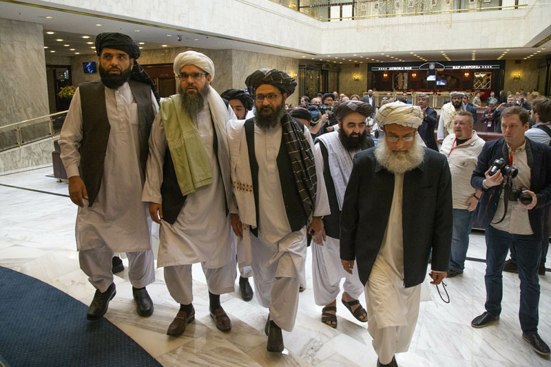 Mullah Abdul Ghani Baradar, the Taliban group's top political leader, third from left, arrives with other members of the Taliban delegation for talks in Moscow, Russia, May 28, 2019. Photo: AP/File