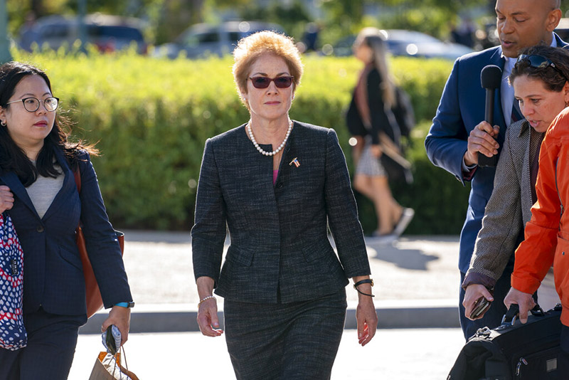 FILE - In this October 11, 2019 file photo, former US ambassador to Ukraine Marie Yovanovitch, centre arrives in Capitol Hill, in Washington, to testify before congressional lawmakers as part of the House impeachment inquiry into President Donald Trump. Photo: AP