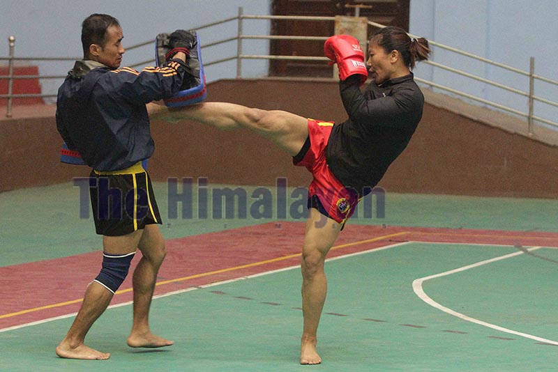 Junu Rai (left) Sanshou player of Wushu practicing  during their training for the 13th South Asian Games at Army Physical and Fitness Training Center, Lagankhel in Lalitpur on Wednesday. Photo: Udipt Singh Chhetry/THT