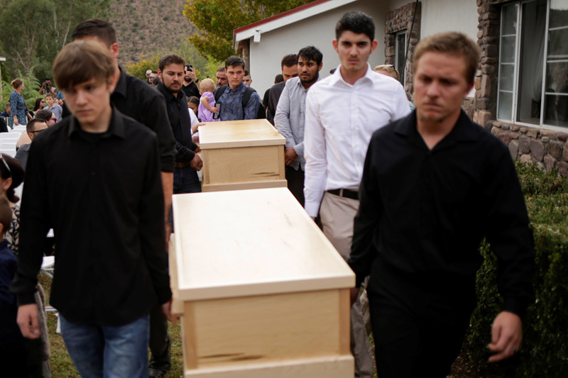 Relatives carry coffins of Rhonita Miller and her children Howard, Kristal, Titus, and Teana, who were killed by unknown assailants, during their funeral service in La Mora, Sonora, Mexico November 7, 2019. Photo: Reuters