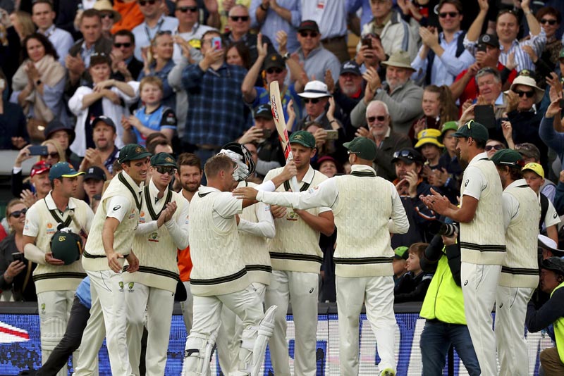 Australia's David Warner celebrates his record 335 not out during their cricket test match against Pakistan in Adelaide, Saturday, November 30, 2019. Photo: AP