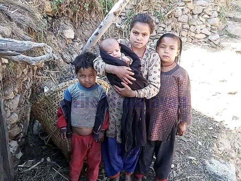 All four children of Pulti Rawal namely Sunita Rawal(9), Nisha Rawal(7) Paras Rawal,4, and a month old son are seen posing for a camera. Photo: Prakash Singh/THT