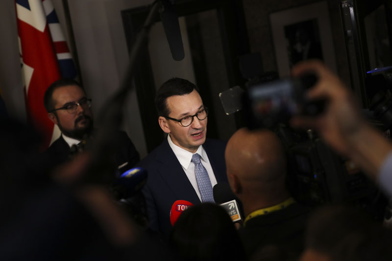 Polish Prime Minister Mateusz Morawiecki speaks with the media at the end of an EU summit in Brussels, Friday, Dec 13, 2019. Photo: AP