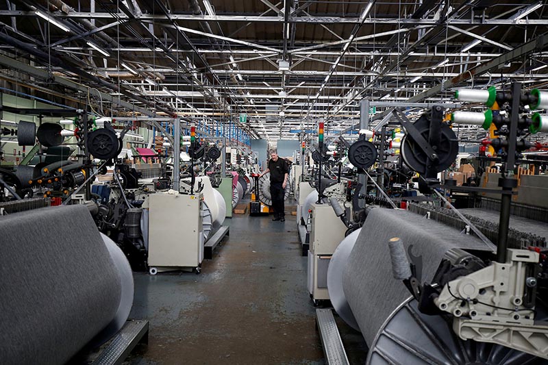 FILE - A general view of the factory floor at Camira Fabrics in Huddersfield, Britain, May 2, 2017.  Photo: Reuters