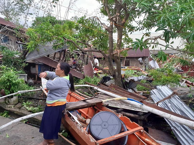 A woman is seen near storm debris in Biliran, Philippines December 26, 2019. in this picture obtained from social media. Photo: VERMALYN MALOLOY-ON NAVARRETE via Reuters