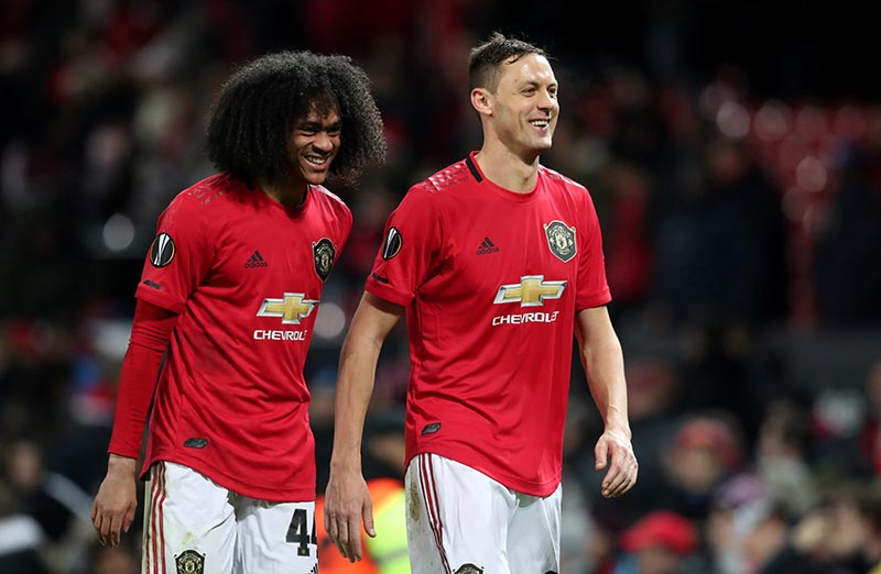 Manchester United's Nemanja Matic and Tahith Chong celebrate at the end of the match during the Europa League Group L match between Manchester United and AZ Alkmaar, at Old Trafford, in Manchester, Britain, on December 12, 2019. Photo: Reuters
