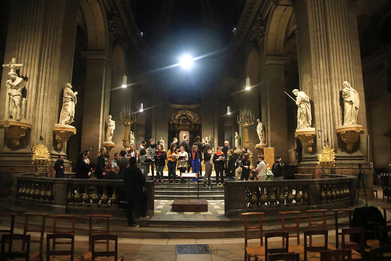 In this photo taken Monday, December 16, 2019, members of the Notre Dame cathedral choir rehearse at the Saint Sulpice church in Paris. Notre Dame Cathedral kept holding services during two world wars as a beacon of hope amid bloodshed and fear. It took a fire in peacetime to finally stop Notre Dame from celebrating Christmas Mass for the first time in more than two centuries. Photo: AP