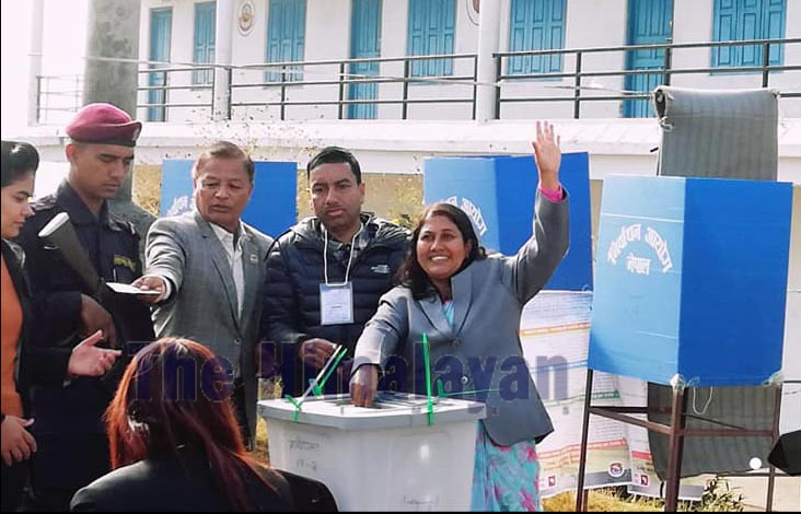 Candidate Bidhya Bhattarai Adhikari from the ruling Nepal Communist Party (NCP) casting ballot at Shanti Udaya Secondary School voting centre in Pokhara, Kaski,u00a0 on Saturday.u00a0 She had filed her candidacy for the parliamentary member from Kaski-2. Photo: THT