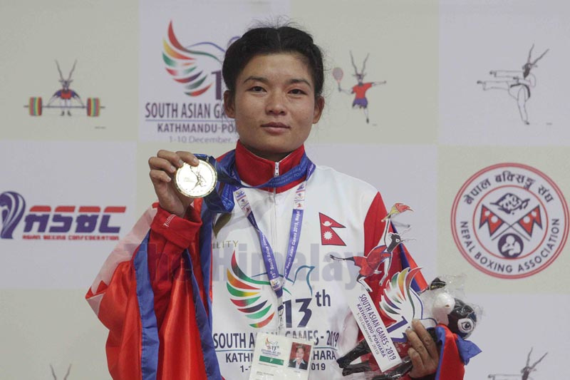 Minu Gurung poses for a photo after winning gold medal in Lalitpur on Monday, December 9, 2019. Photo: Udipt Singh Chhetry/THT