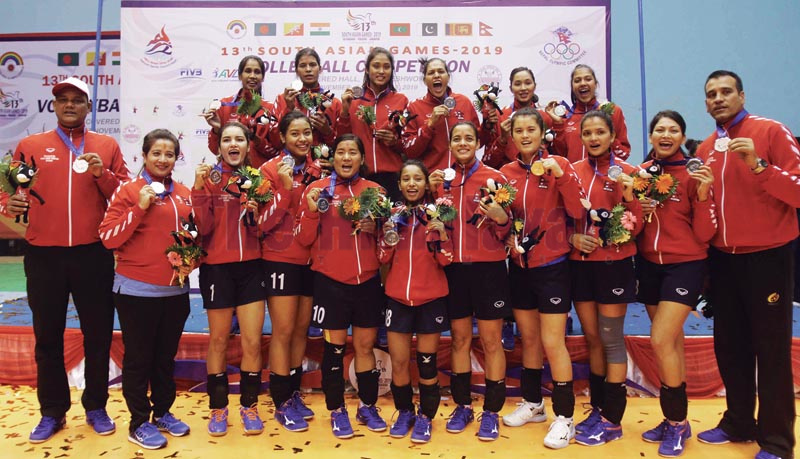 Nepali women’s volleyball team after winning silver medal in the ongoing 13th South Asian Games on Tuesday, December 3, 2019. Photo: Udipt Singh Chhetry/THT