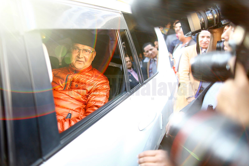 Prime Minister KP Sharma Oli gestures after being discharged from the Tribhuwan University Teaching Hospital, in Kathmandu, on Thursday, December 05, 2019.  PM Oli underwent appendectomy following complaints of abdominal pain, among other health issues. Photo: Skanda Gautam/THT