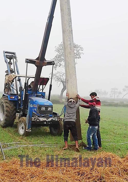 An electricity pole being removed from the Das Gaza area in Ishanath Municipality, Rautahat, on Monday. , December 30, 2019. Photo: THT