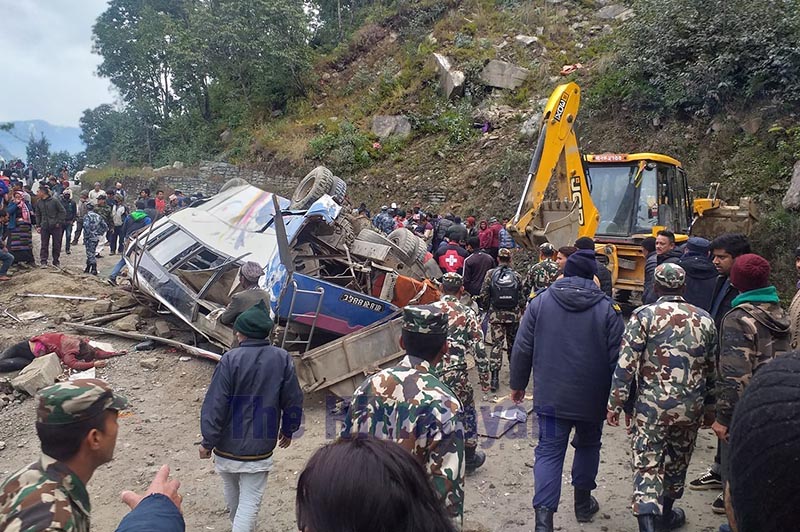 Security personnel along with the locals gathering after a bus met with an accident at Sunkoshi Rural Municipality, in Sindhupalchowk, on Sunday, Decenber 15, 2019. Photo: THT