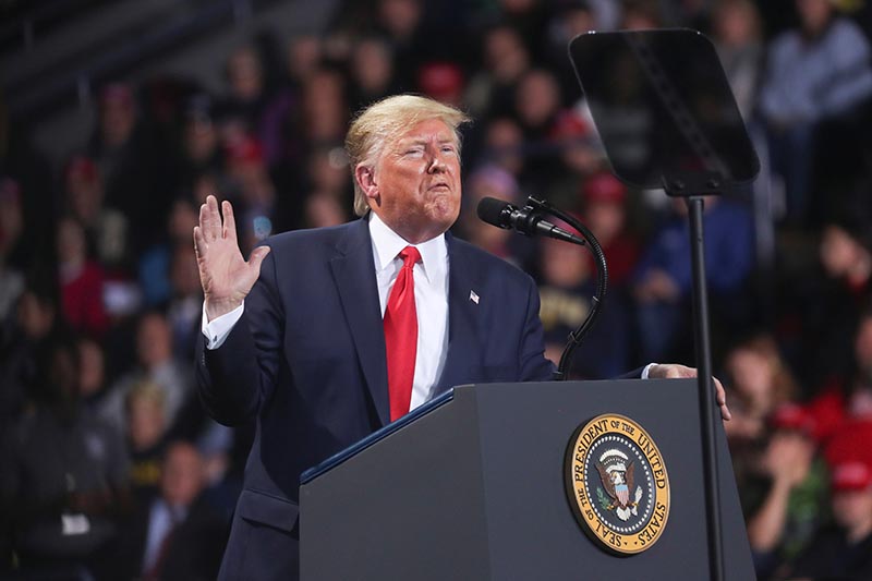 US President Donald Trump reacts while speaking during a campaign rally in Battle Creek, Michigan, US, on December 18, 2019. REUTERS/Leah Millisu2028