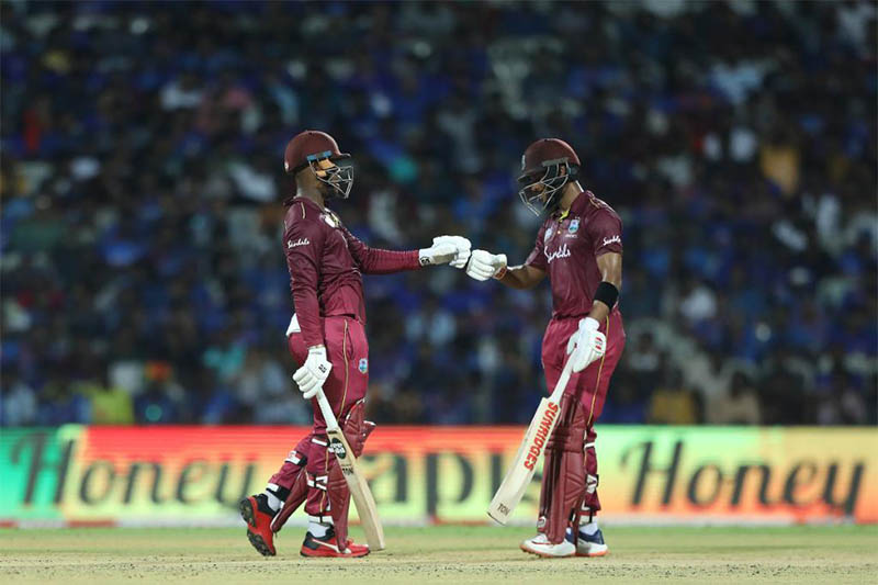 West Indies batsmen Shimron Hetmyer and Shai Hope punch gloves in the middle while batting against India during 1st ODI in Chennai, on Sunday, December 15, 2019. Courtesy: ICC/Twitter