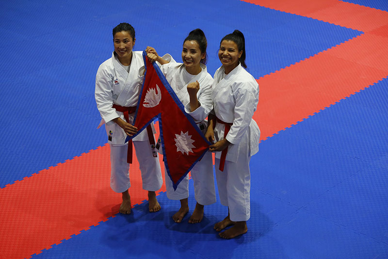 Nepal's Nirmala Tamang, Suru Karki and Sangita Magar after winning gold medal in Women’s Team Kata Category of Karate at Nepal Karate Academy in Satdobato, Lalitpur, on Monday, December 02, 2019. Photo: RSS