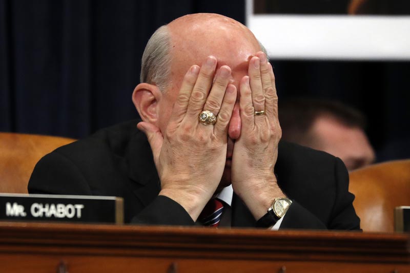 Rep. Louie Gohmert, R-Texas, rubs his face during a House Judiciary Committee markup of the articles of impeachment against President Donald Trump, Wednesday, Dec. 11, 2019, on Capitol Hill in Washington. Photo: AP