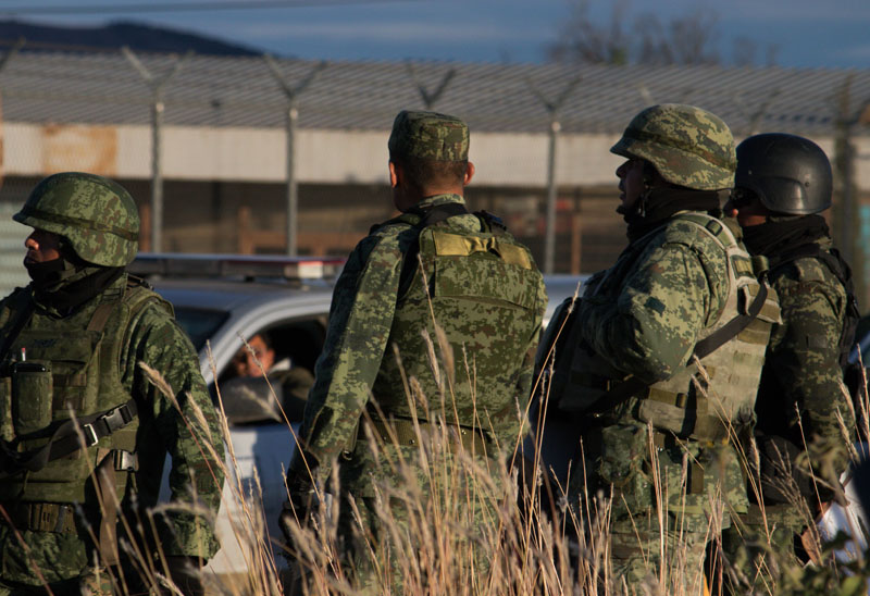 Members of the Mexican National Guard stand guard as they keep watch outside the prison after sixteen inmates were killed and five were wounded in a prison fight at the Regional Center for Social Reintegration in the town of Cieneguillas, located on the western flank of state capital Zacatecas, Mexico December 31, 2019. Picture taken December 31, 2019. Photo: Reuters
