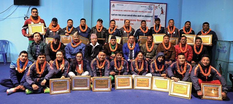 The 13th South Asian Games medal winning boxers with officials at a felicitation programme in Kathmandu on Monday. Photo: THT
