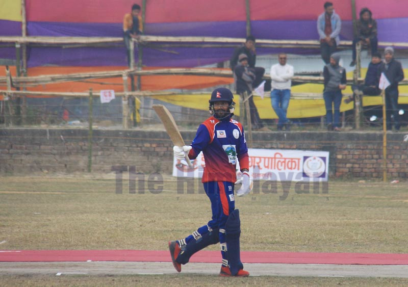 NPCu2019s Dipendra Singh Airee celebrates after scoring half century against Province-2 during their Manmohan Memorial National One-Day Cricket Tournament match at the Inaruwa grounds in Sunsari on Friday.n Photo: THT