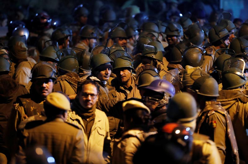 Police in riot gear stand guard inside the Jawaharlal Nehru University (JNU) after clashes between students in New Delhi, India, January 5, 2020. Photo: AP