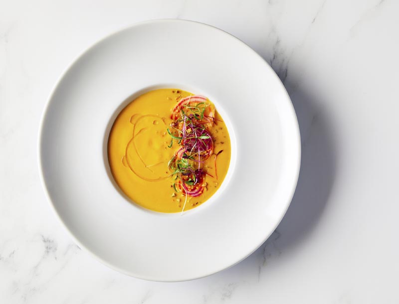 This image released by the Golden Globe Awards shows a chilled golden beet soup, prepared by Beverly Hilton Executive Chef Matthew Morgan. The dish will be served at the Golden Globe Awards on Sunday. Photo: AP