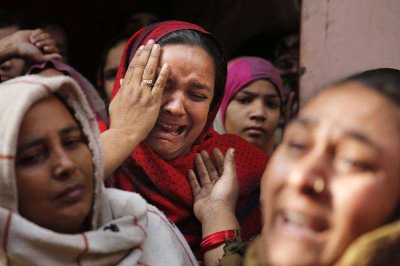 In this Tuesday, Dec. 24, 2019, photo, sister of Mohsin Ahmad, a laborer who was shot and killed allegedly in police firing during protests against Citizenship Amendment Act, cries outside her residence in Meerut, India. Photo: AP