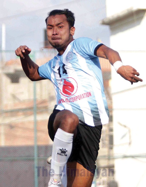 NOC MMCu2019s Anjan Bista celebrates after scoring a goal against Sankata Club during their Qatar Airways Martyrs Memorial A Division League match in Lalitpur on Wednesday. Photo: Udipt Singh Chhetry / THT