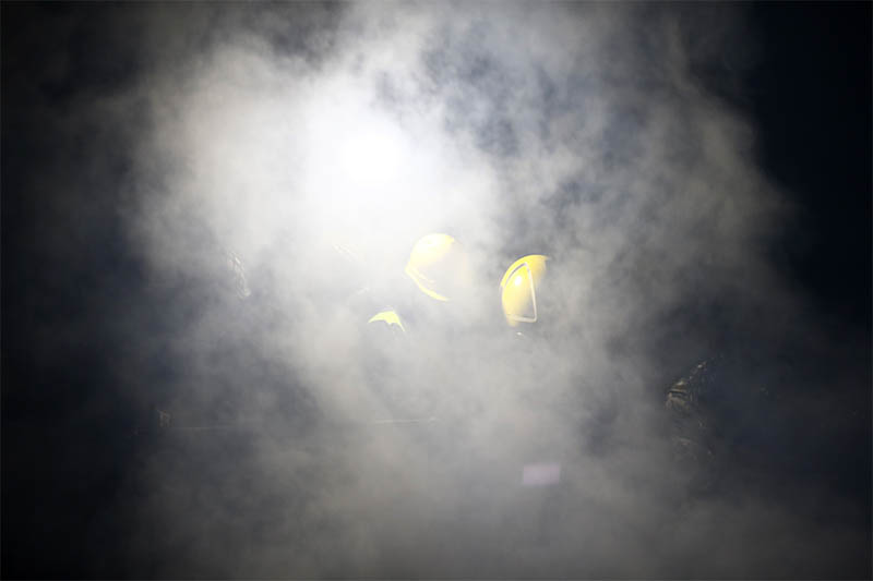 Firefighters along with Nepal Police and Nepal Army work to douse fire at a residential building in Ason, Kathmandu, on Friday, January 03, 2020. Photo: Skanda Gautam/THT