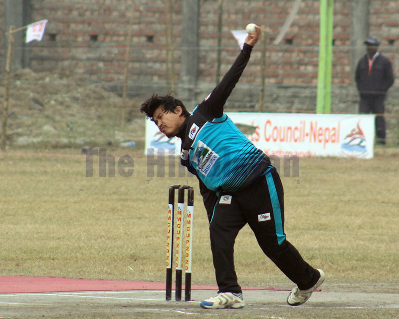 Sudurpaschim Province spin bowler Binod Lama bowls against Gandaki Province during MM National One-Day Cricket Tournament in Inaruwa of Sunsari district, on Sunday, January 12, 2020. Photo: Santosh Kafle/THT