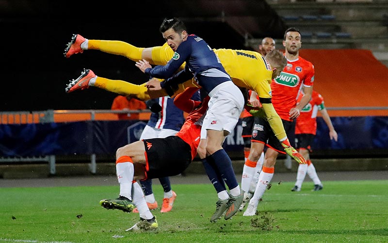 Paris St Germain's Pablo Sarabia in action with Lorient's Paul Nardi during the Coupe de France Round of 32 match betweeen FC Lorient and  Paris St Germain, at Stade Yves Allainmat, in Le Moustoir, Lorient, France, on January 19, 2020. Photo: Reuters