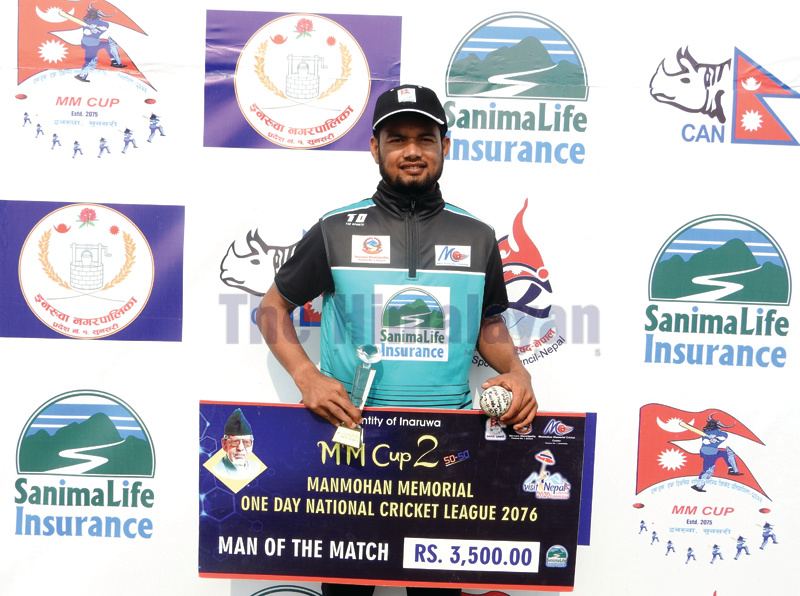 Sher Malla of Sudurpaschim Province holds the man-of-the-match award after the Manmohan Memorial National One-Day Cricket Tournament match against Malaysia Selection-XI at the Inaruwa grounds in Sunsari on Saturday. Photo: THT