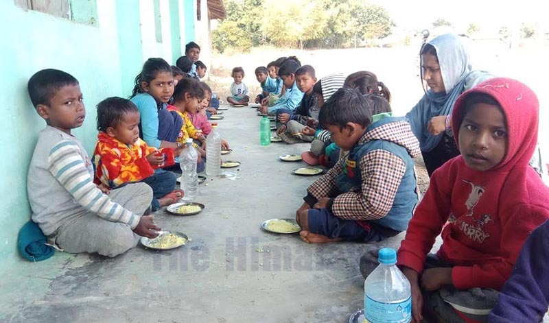Children at Dalit Basic Level School having day meal, in Siraha, on Monday, January 20, 2020. Photo: THT