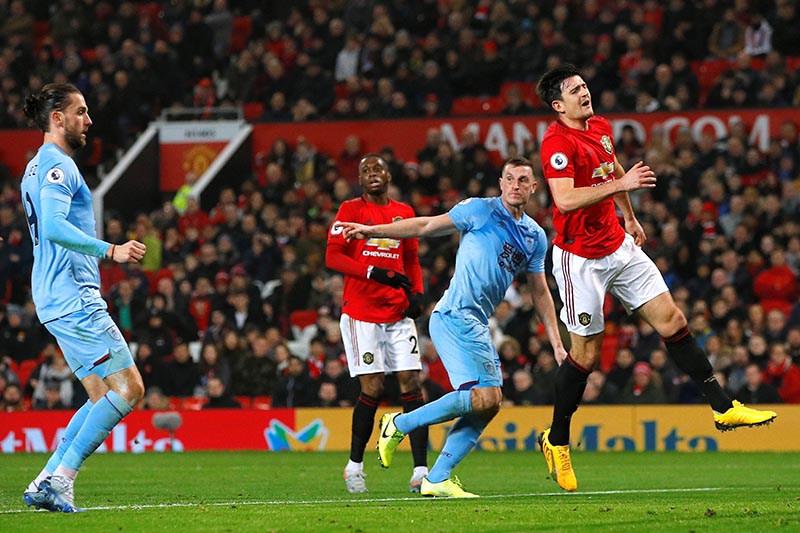 Burnley's Chris Wood celebrates scoring their first goal during the Premier League match between Manchester United and Burnley, at Old Trafford, in Manchester, Britain, on January 22, 2020. Photo: Reuters