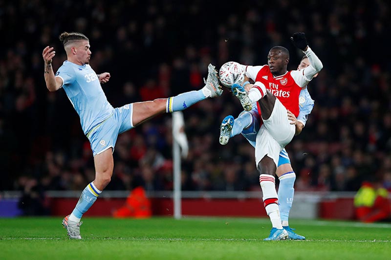 Leeds United's Kalvin Phillips in action with Arsenal's Nicolas Pepe during their FA Cup Third Round  match at Emirates Stadium, in London, Britain, on January 6, 2020. Photo: Reuters