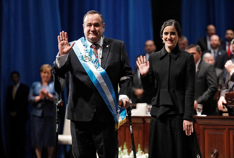 Alejandro Giammattei waves after his swearing-in ceremony as Guatemala's President in Guatemala City, Guatemala January 14, 2020. Photo: Reuters