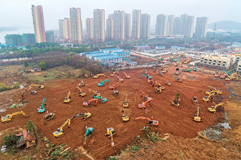 This image shows aerial view of excavators at the construction site of a new hospital being built to treat patients from a deadly virus outbreak in Wuhan in China's central Hubei province, on Friday, January 24, 2020. China is rushing to build a new hospital in a staggering 10 days to treat patients at the epicentre of a deadly virus outbreak that has stricken hundreds of peopl. Photo: AFP