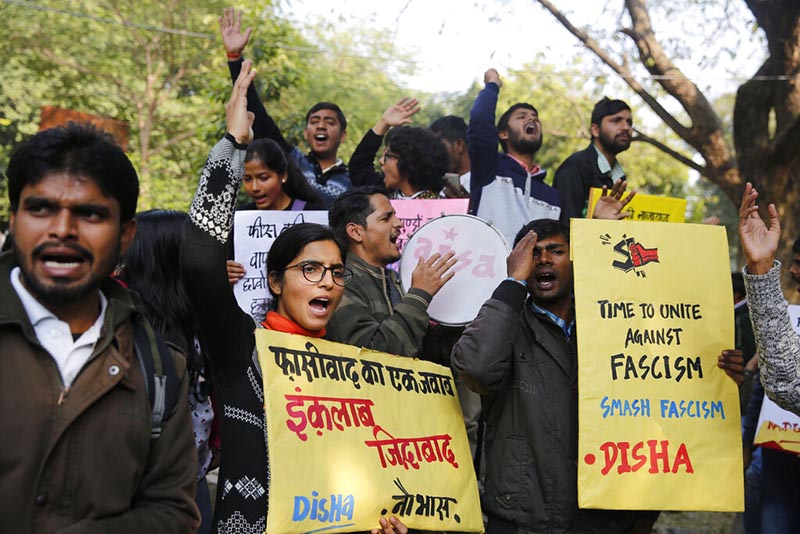 Allahabad University students hold placards during a protest against Sunday's assault by masked assailants at New Delhi's Jawaharlal Nehru University in Prayagraj, India, Monday, January 6, 2020. Photo :AP