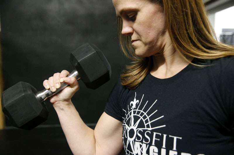 Melissa Breaux Bankston, a CrossFit athletic trainer at CrossFit Algiers in New Orleans, poses for a portrait at the gym Monday, Dec 23, 2019. She participates in an intermittent fasting diet. Photo: AP