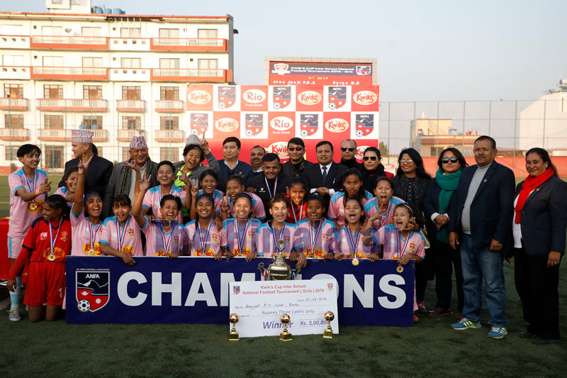 Players and officials of Jana Jyoti Public High School celebrate after winning the Kwiku2019s Cup Inter-school Girls Football Tournament in Lalitpur on Sunday. Photo: THT