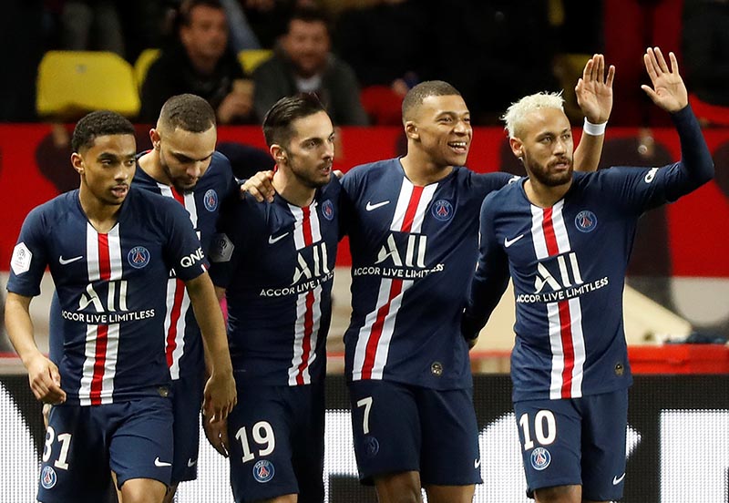Paris St Germain's Kylian Mbappe celebrates scoring their fourth goal with teammates during the Ligue 1 match between AS Monaco and Paris St Germain, at Stade Louis II, in Monaco, on January 15, 2020. Photo: Reuters
