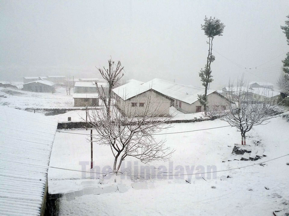 Elevated regions in Manang and Lamjung get snowfall after rain hits the places hard, affecting lives in the region. Tourists travelling towards Annapurna Circuit were requested to halt their journey due to snow, especially those touring from Chame side. Photo: Ramji Rana/THT