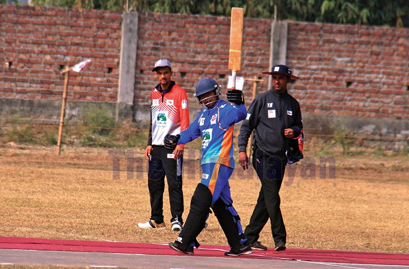 Ainool Haqqiem of Malaysia Selection-XI celebrates after scoring a half century against Gandaki Province during the Manmohan Memorial National One-Day Cricket Tournament in Sunsari on Monday. Photo: THT