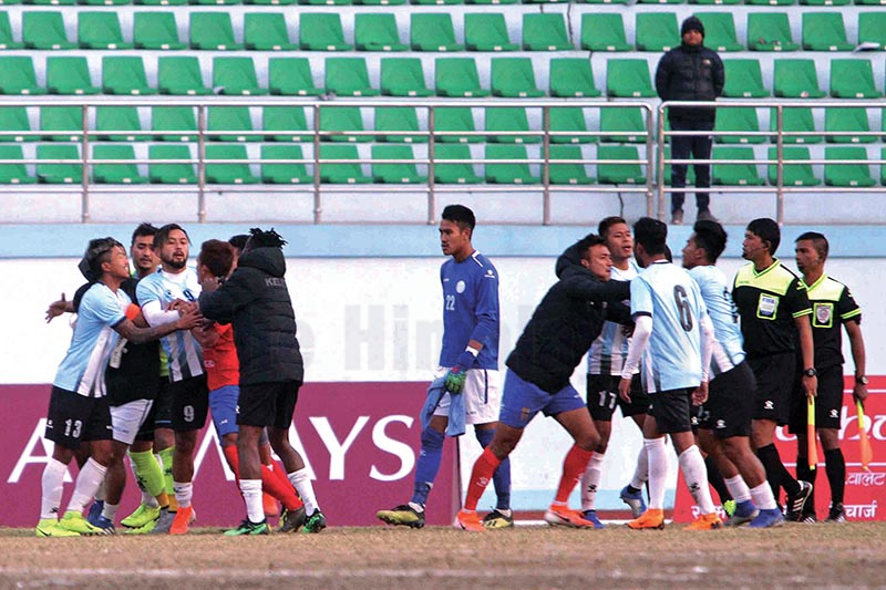 Players and officials of MMC and Machhindra FC clash after their Qatar Airways Martyrs Memorial A Division League match in Kathmandu on Monday. Photo: Udipt Singh Chhetry / THT